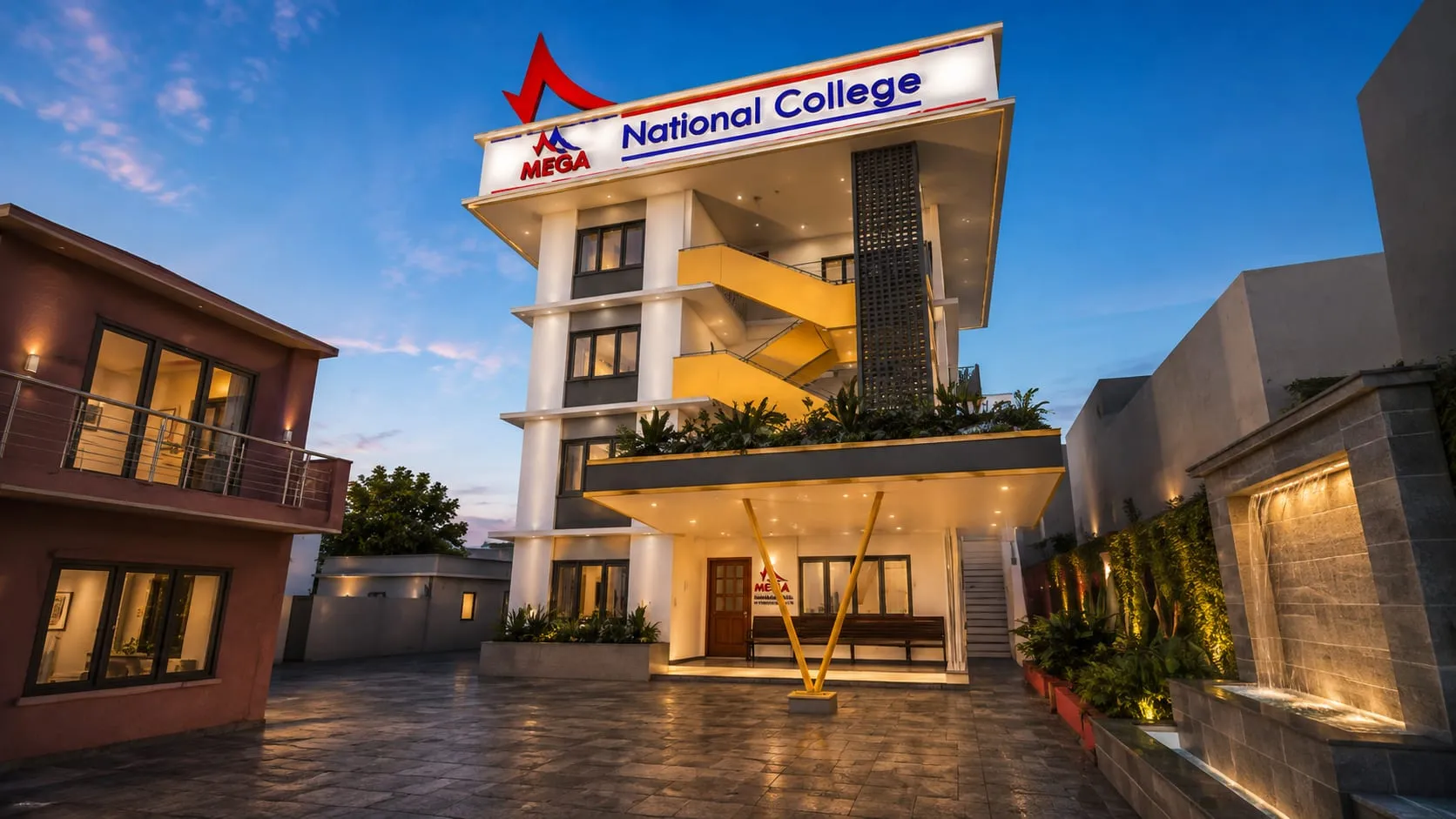Dusk view of the college entrance forecourt